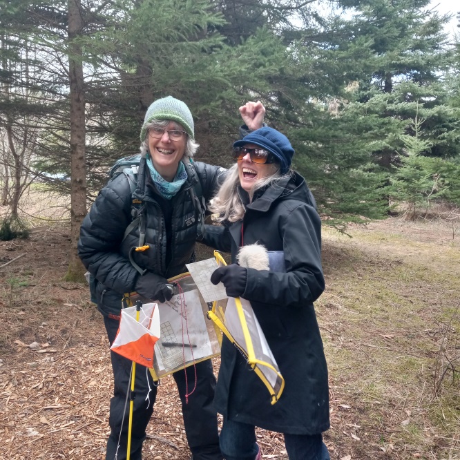 Participant of our Intro Navigation and Orienteering Course celebrate finding a control point during an the orienteering simulation.